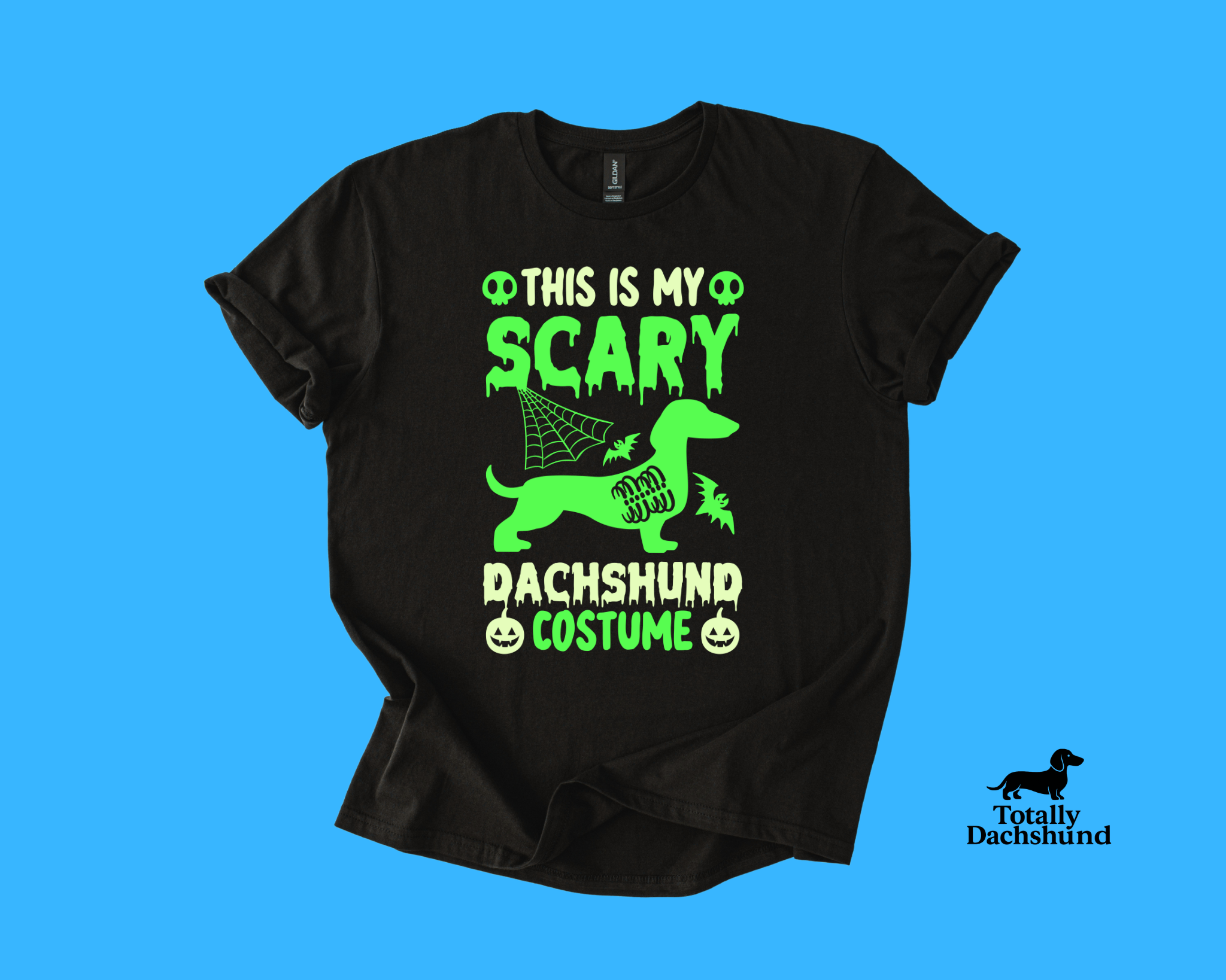 black tee with green dachshund and spooky design