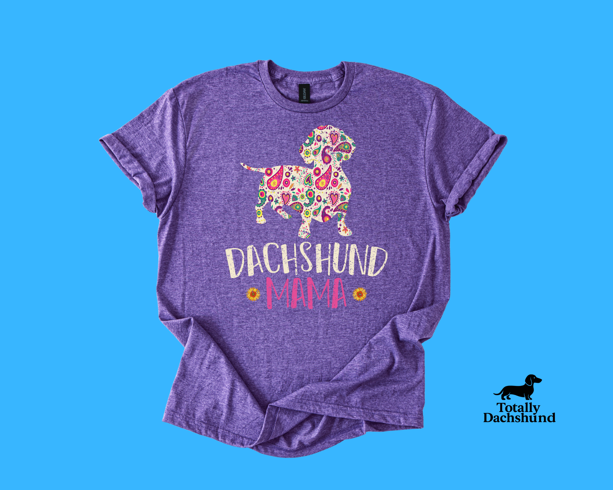Colorful paisley dachshund silhouette with text “Dachshund Mama” and sunflowers – purple dog lover shirt